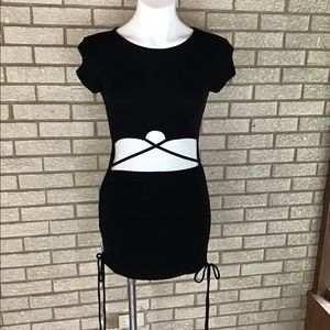 Windsor black stretch knit dress with midriff out size medium.